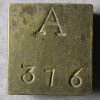 Interesting brass square Bullion weight marked A 376 (grains)
