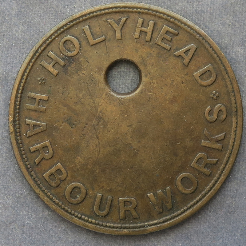 Wales, Holyhead Harbour Works - brass 40mm token / tally numbered 1077 ...