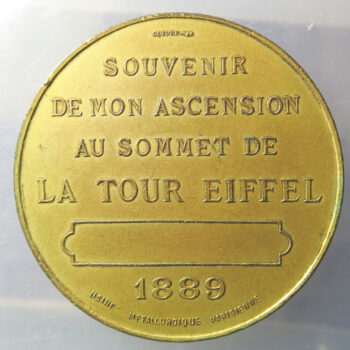 Eifel Tower souvenir of Ascent medals x2 1889 when buylt and 1900 for Exhibition this by Alexandre Charpentier