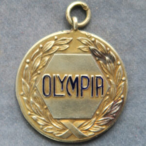 Olympia gold and enamel pass named to R G Heaton, managing director, who organised the first London International Horse Show in 1907