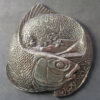 MB109004 Gwyniad mythological fish cast pewter medal by Bethan Williams for BAMS