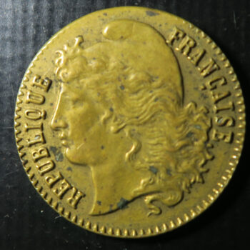 France brass shell on card advertising Token - Brunswick Furriers (Paris)