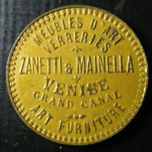 brass shell on card advertising Token - Italy Venice - Zanetti & Mainella glass sellers rev. Victoria