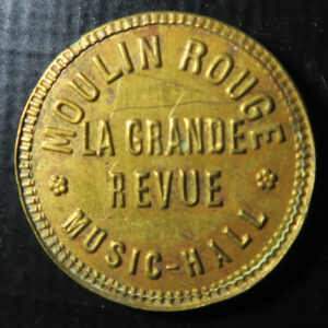 France brass shell on card advertising Token - Moulin Rouge La Grande Revue Music Hall - Monnais de Singe - Monkey Money