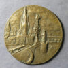 MB109355 Uniface bronze medal plaque bridge with statues European city