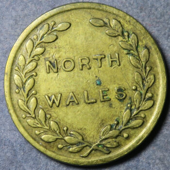 Caernarvonshire, LLANFAIRFECH, QUEENS HOTEL, GOOD FOR ONE SHILLING rev. North Wales in wreath Brass 19.2mm. plain edge Cox 56