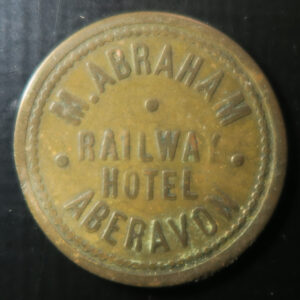 Wales Pub token check -Glamorganshire, ABERAVON, RAILWAY HOTEL M. ABRAHAM rev. 11/2D Brass 24.3mm. plain edge VF Cox 135