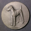 GB Airedale? Terrier dog silvery medal 20th century 38mm.