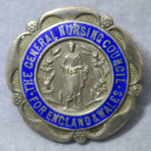 The General Nursing Council of England and Wales, silver and enamel badge named to J. A. Anderson  S.R.N. 57837 28-11-30