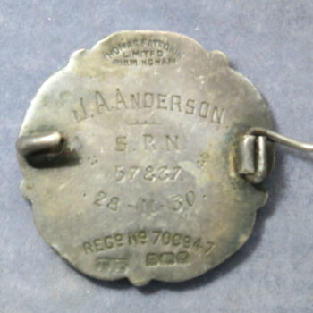 The General Nursing Council of England and Wales, silver and enamel badge named to J. A. Anderson  S.R.N. 57837 28-11-30