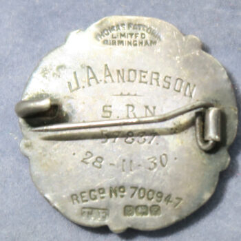The General Nursing Council of England and Wales, silver and enamel badge named to J. A. Anderson  S.R.N. 57837 28-11-30