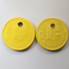 Metropolitan Electric Tramways, Ltd. 1d yellow plastic Employees token 2 varieties 1904-33 North LondonMetropolitan Electric Tramways, Ltd. 1d yellow plastic Employees token 2 varieties 1904-33 North London