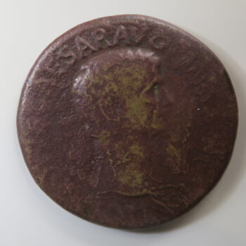 Roman, Claudius Brass Sestertius countermarked NCAPR by Nero to validate a worn coin