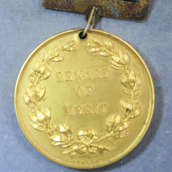 Reward of Merit for Arithmatic award medal by Allen & Moore - gilt pewter - edge inscribed Presented by W Triggs Mayor of guildford to w. C. Mason 1877