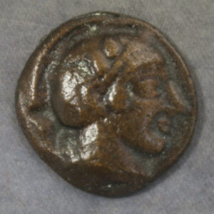 Helmeted head of Athene like an ancient Greek coin bronze