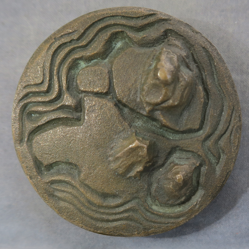 Abstract bronze islands surrounded by water