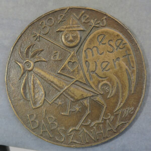 Puppet riding a cockerel bronze medal