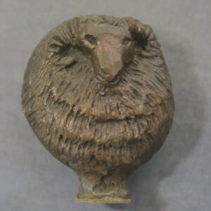 Sheep with curved horns standing medal sculpture