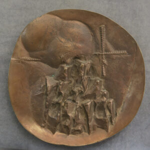 Abstract bronze medal with cross, cloud rocks